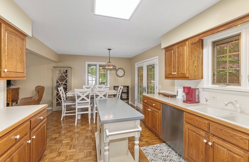 Holland House | Ideal Lakeshore location in serene wooded landscape with waterfalls.
