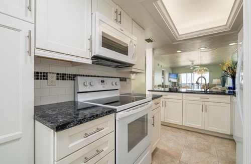 South Island Apartment | Ideal Virtual Workplace, pool, and direct view of the Gulf at the Riviera Club