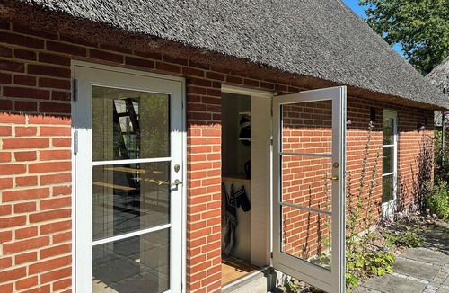 Skanderborg Municipality House | Idyllic house by Mossø with courtyard