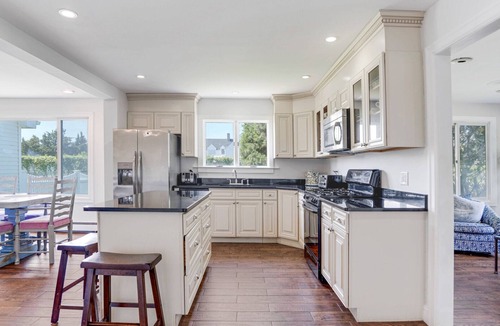 Westhampton Beach House | Idyllic traditional home with spacious rooms, fenced yard, and private pool.