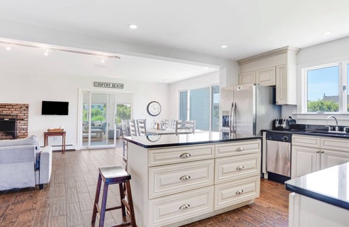 Westhampton Beach House | Idyllic traditional home with spacious rooms, fenced yard, and private pool.
