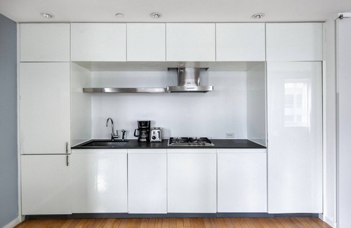 Central New York City Apartment | Impeccable Midtown 2BR w/W/D, nr Rockefeller Ctr, by Blueground