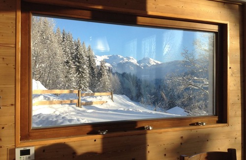 Les Gets Apartment | In a beautiful chalet, large apartment, mountain view, garden, terrace, sauna