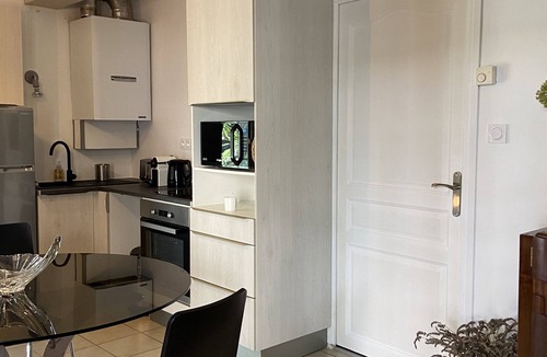 Nebias House | In a garden facing the mountains, a charming little house for 2 people