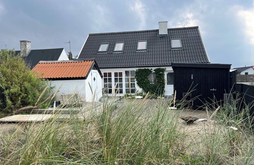 Klitmoller House | In Cold Hawaii with beach in backyard