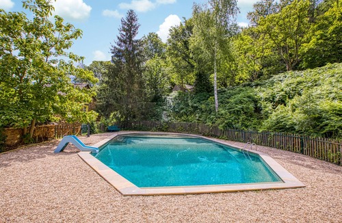 Mirandol-Bourgnounac House | In idyllic location of a forest and near the river Vaur is this cozy wooden house.
