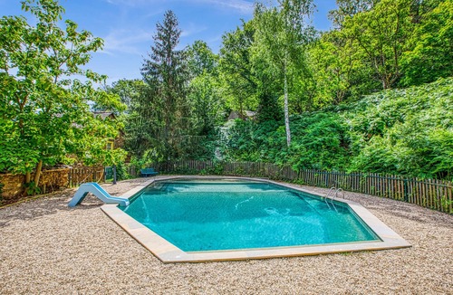 Mirandol-Bourgnounac House | In idyllic location of a forest and near the river Vaur is this cozy wooden house.
