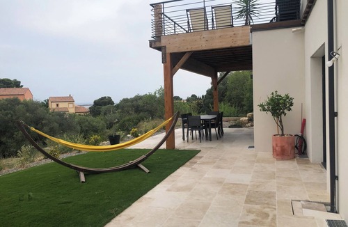 Leucate House | In Leucate village, accommodation 100 m2 sea view in garrigue.