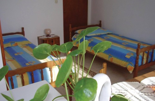 Plomin Apartment | In the bay of Plomin, surrounded by greenery and near the industrial area, are these apartments.