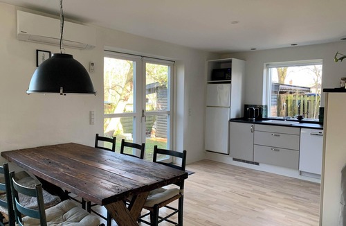 Rageleje House | In the charming coastal town of Rågeleje, this lovely holiday home is located.