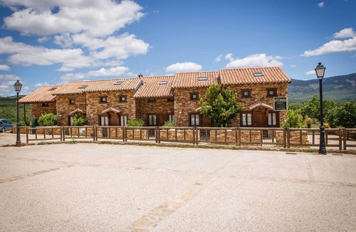 Horcajuelo de la Sierra Ski Chalet | In the Medium you can enjoy a large terrace with barbecue and a small front patio