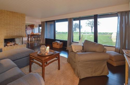 Faxe Ladeplads House | In the first row to the water lies the cozy cottage.