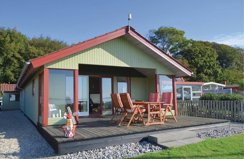 Haarby House | In the first row on the water, with a fantastic view of the Little Belt and Helgenæs Bay you will fi