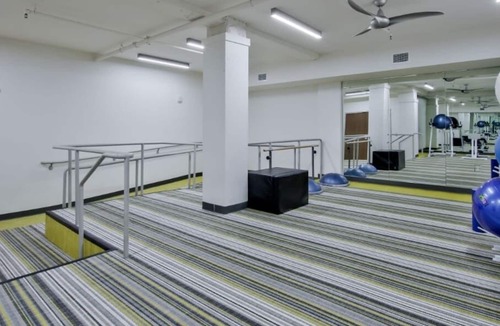 Downtown Wichita Apartment | In Unit Laundry with Spacious Kitchen in Art Gallery Alley