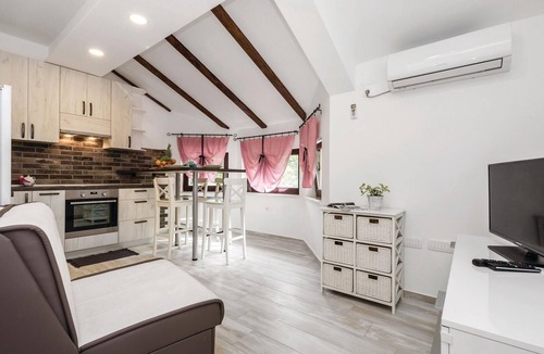Marcelji Apartment | In Viskovo, a suburb of Rijeka, lies this lovingly and modernly furnished attic apartment.