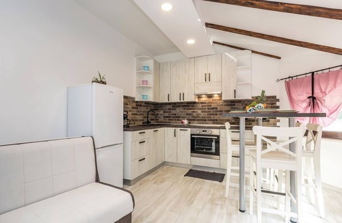 Marcelji Apartment | In Viskovo, a suburb of Rijeka, lies this lovingly and modernly furnished attic apartment.