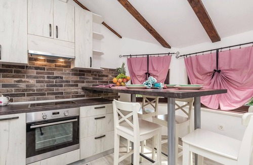 Marcelji Apartment | In Viskovo, a suburb of Rijeka, lies this lovingly and modernly furnished attic apartment.