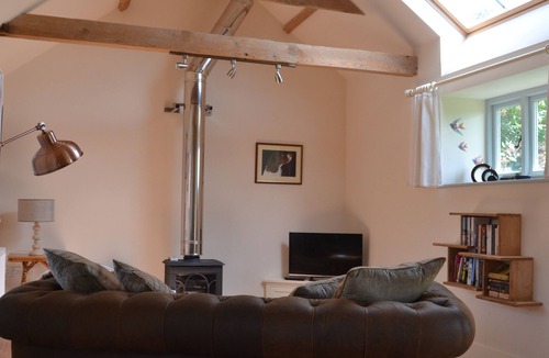 Wyverstone House | Individual barn overlooking open fields, dog friendly with open fire