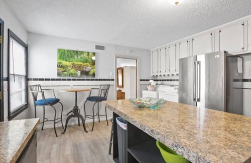 Heart of Lubbock House | Indonesian "Luxury Oasis" - a romantic getaway, king bed, hot tub