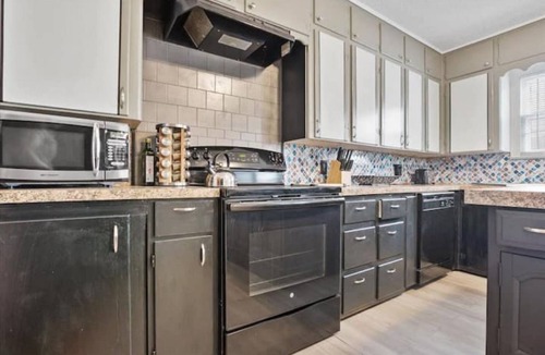 Heart of Lubbock House | Indonesian "Luxury Oasis" - a romantic getaway, king bed, hot tub