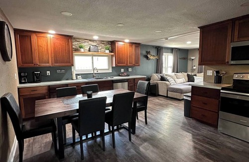 Genoa House | Indoor Fish Cleaning - Darts - Poker - Newly Remodeled