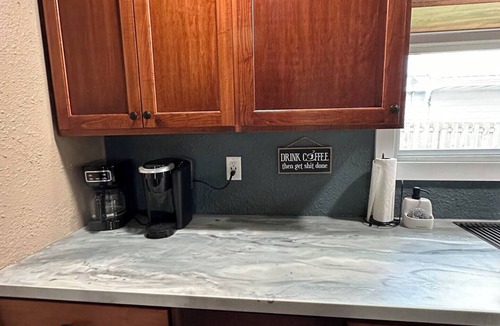 Genoa House | Indoor Fish Cleaning - Darts - Poker - Newly Remodeled