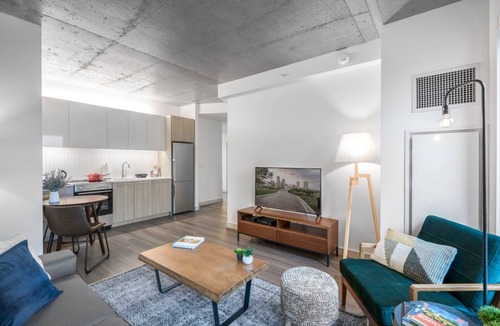 MIT Apartment | Industrial 1BR near MIT w/Gym, Doorman, Roof Deck