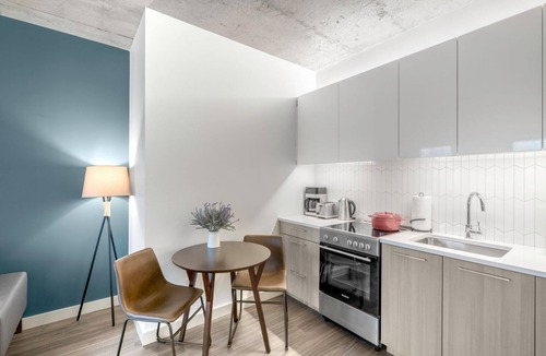 MIT Apartment | Industrial 1BR near MIT w/Gym, Doorman, Roof Deck