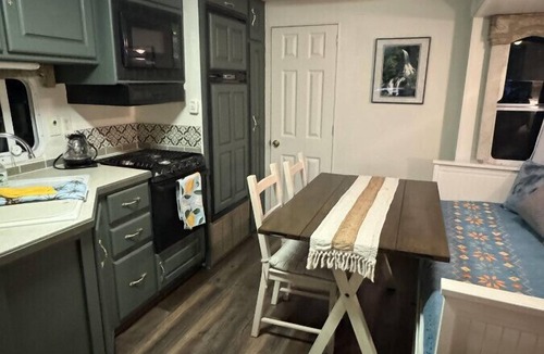 South Central House | Industrial Glamping Hideaway by Downtown