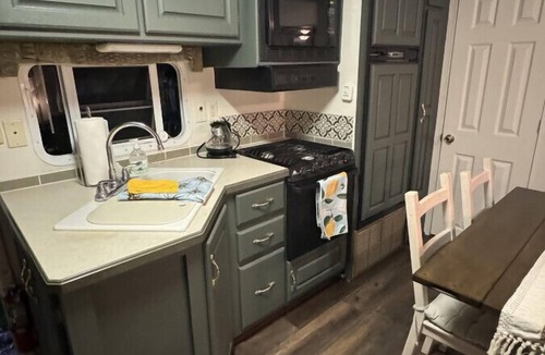 South Central House | Industrial Glamping Hideaway by Downtown