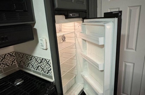 South Central House | Industrial Glamping Hideaway by Downtown