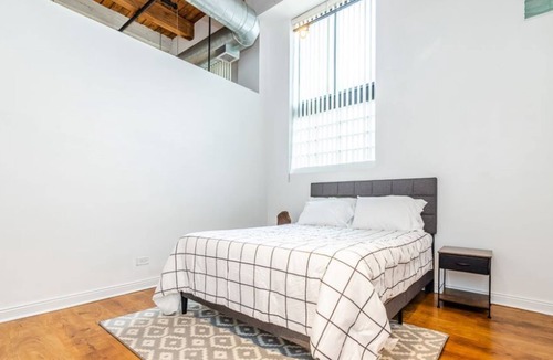 Prairie District Condo | Industrial loft haven