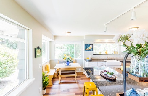 Poulsbo House | Inviting bayside dwelling with beach access, deck, waterfront views, & fireplace