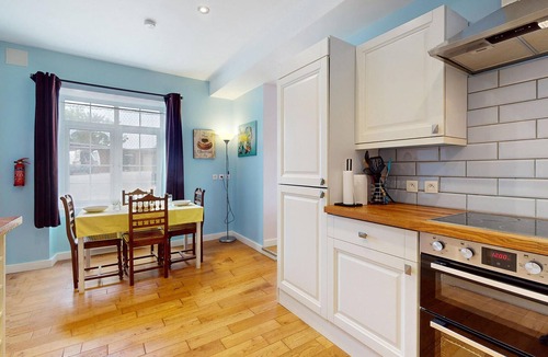 Desertines House | Inviting cottage with indoor community pool and activity room.