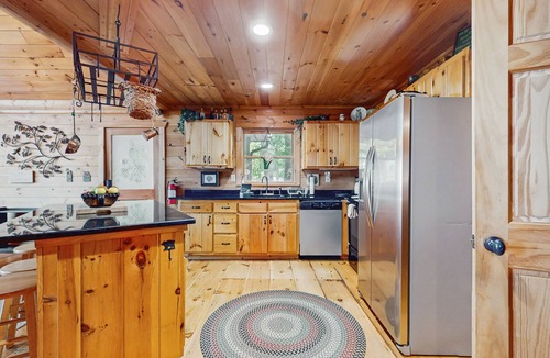 Walnut Mountain Cabin | Inviting forest cabin with pool access & picture windows