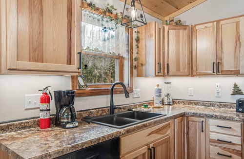 Arkdale House | Inviting home with game room, firepit, full kitchen, & W/D