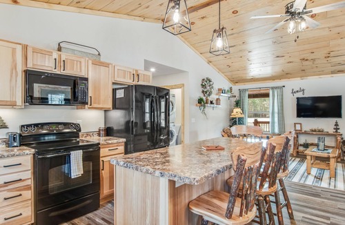 Arkdale House | Inviting home with game room, firepit, full kitchen, & W/D