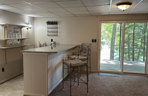 High Point House | Inviting lakefront home with firepit, balcony & W/D - dog-friendly