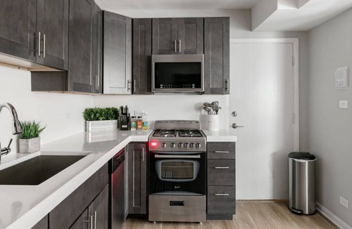 Uptown House | Inviting Stylish Home with Covered Patio