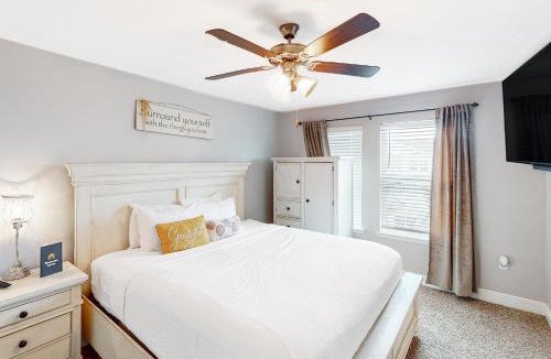 Thomas Drive House | Inviting townhouse with golf nearby pool central AC W&D working desk & chair