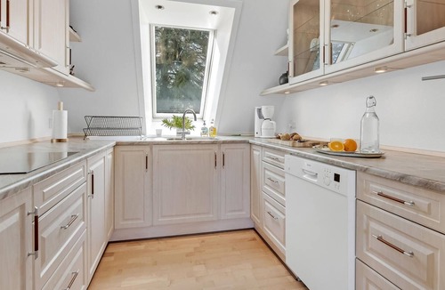 Sabro Apartment | Inviting vacation home with wood stove and grounds, located in a cozy town outside Arhus.