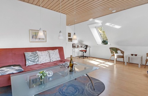 Sabro Apartment | Inviting vacation home with wood stove and grounds, located in a cozy town outside Arhus.