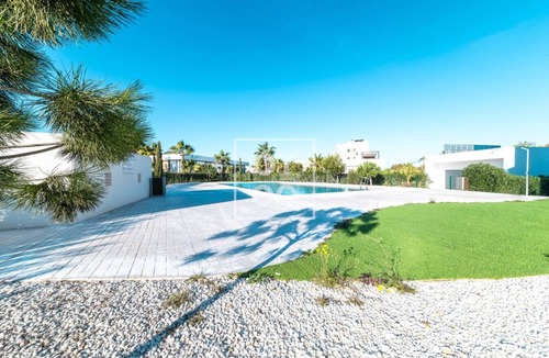 Alhama de Murcia Apartment | Isla de la Sierra: Resort apt, pool, private garden, mountain views - by OYOOSTAYS
