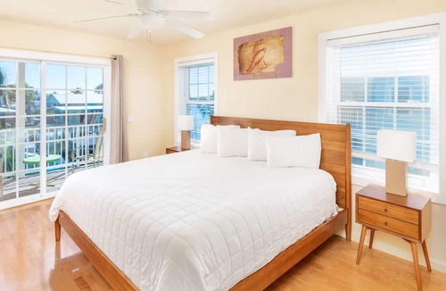 Layton Hotel | Island Retreat 3BR: Canal Views, Full Kitchen, Private Pool & Paddle Board Fun!
