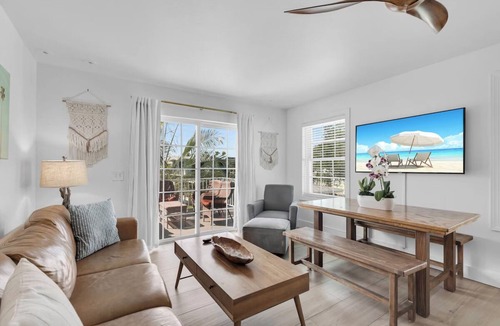 Layton Hotel | Island Retreat 3BR: Canal Views, Full Kitchen, Private Pool & Paddle Board Fun!