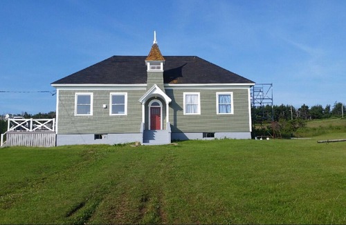Port Hood Cottage | Island Retreat in Elegantly Restored Schoolhoue with Panoramic Ocean Views
