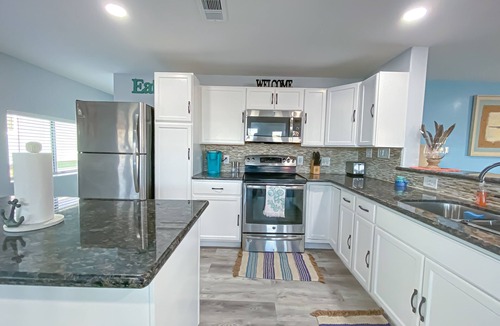 San Luis House | Island Tyme- Canal Waterfront Paradise with Sunset View!
