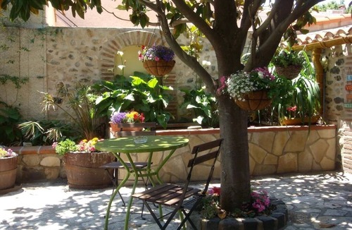 Espira de l'Agly Apartment | Ivy covered stone Mas part of an 18th century former convent.