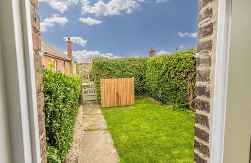 West Lulworth House | Juniper Cottage, Lulworth. Sleeps 5 & Baby