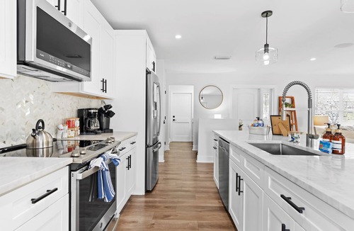 Pine Gardens North House | Jupiter Oasis Heated Pool + Putting Green